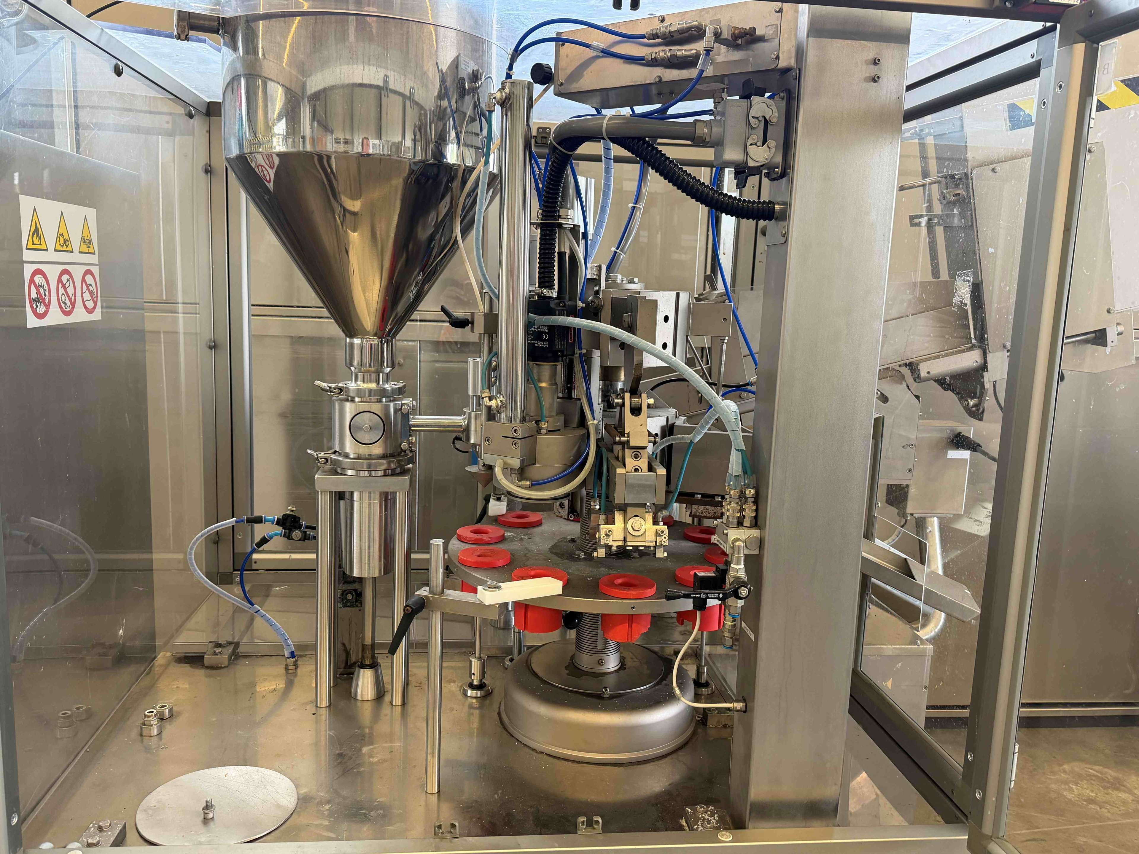 Tube filling and capping machine 4