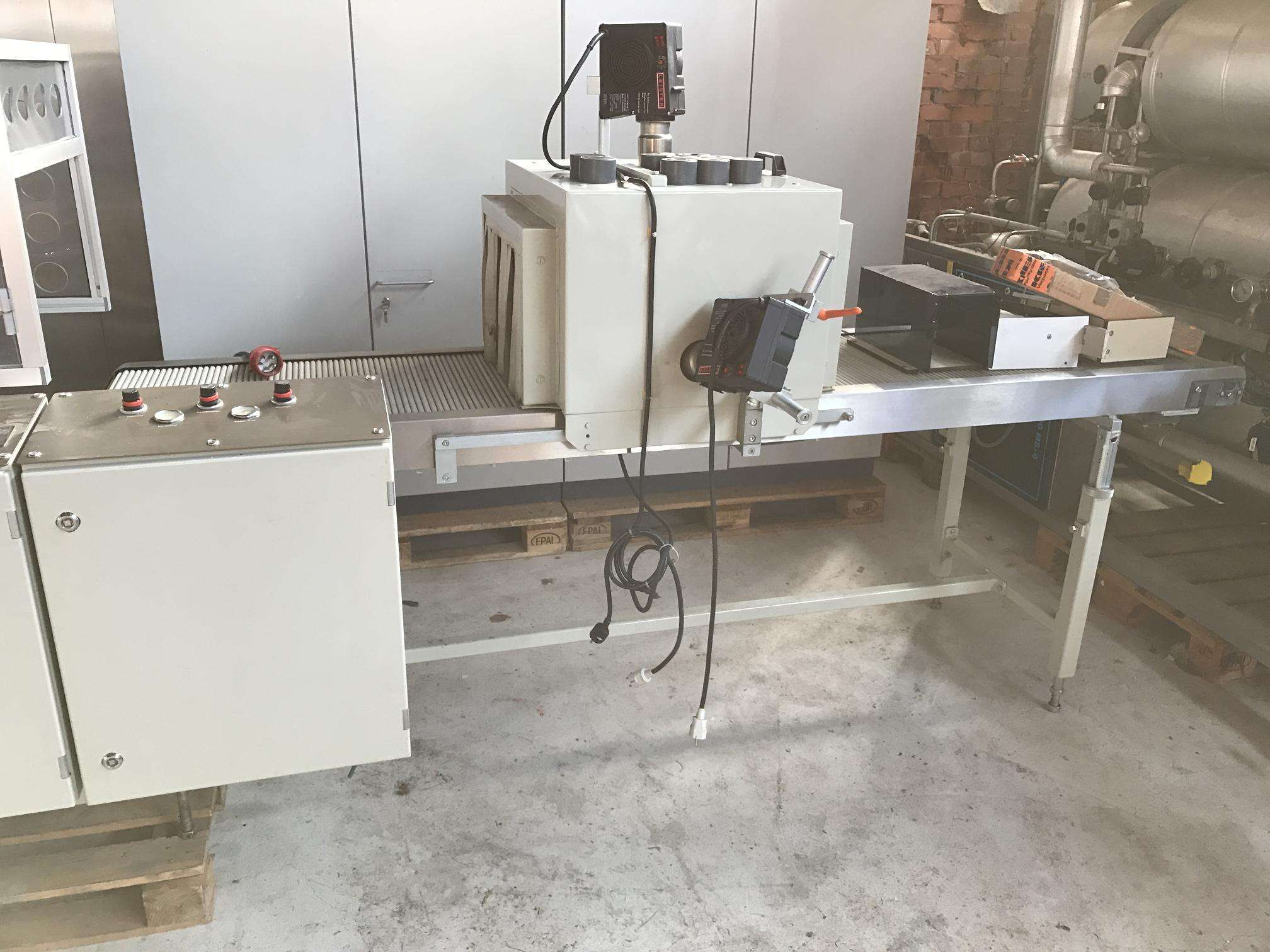 Tensile band eroration machine with shrink tunnel 6